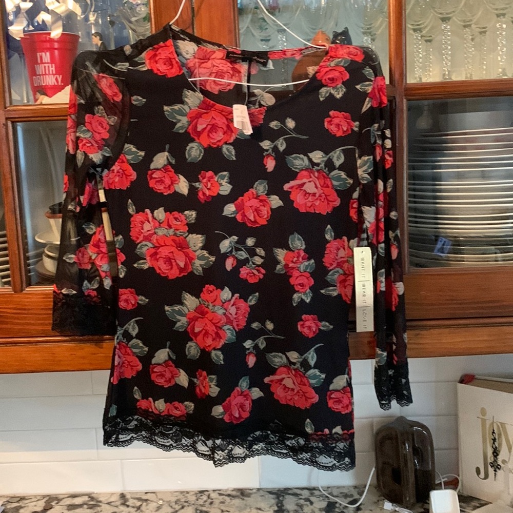 Almost famous floral lined sheer‎ top. NWT. Retail 78